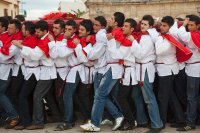 Holy Week Procession, brotherhood members entering the cathedral, Sicily, Italy 2009
