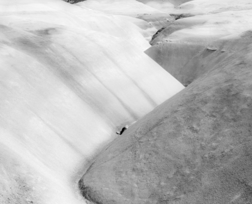 black and white landscape of rolling hills